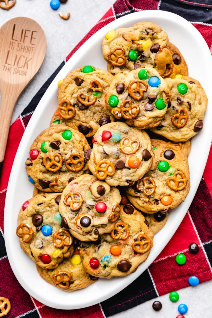 Top down view of cookies filled with m&ms, pretzels, and chocolate chips.