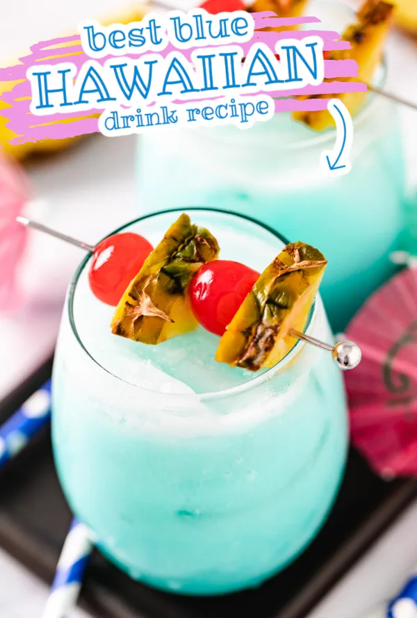 Blue hawaiian drink recipe on a dark board.