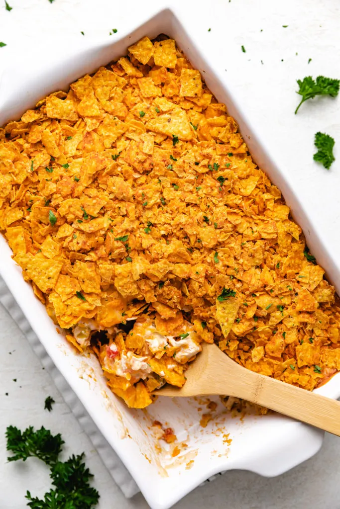 Top down view of baked chicken doritos casserole.