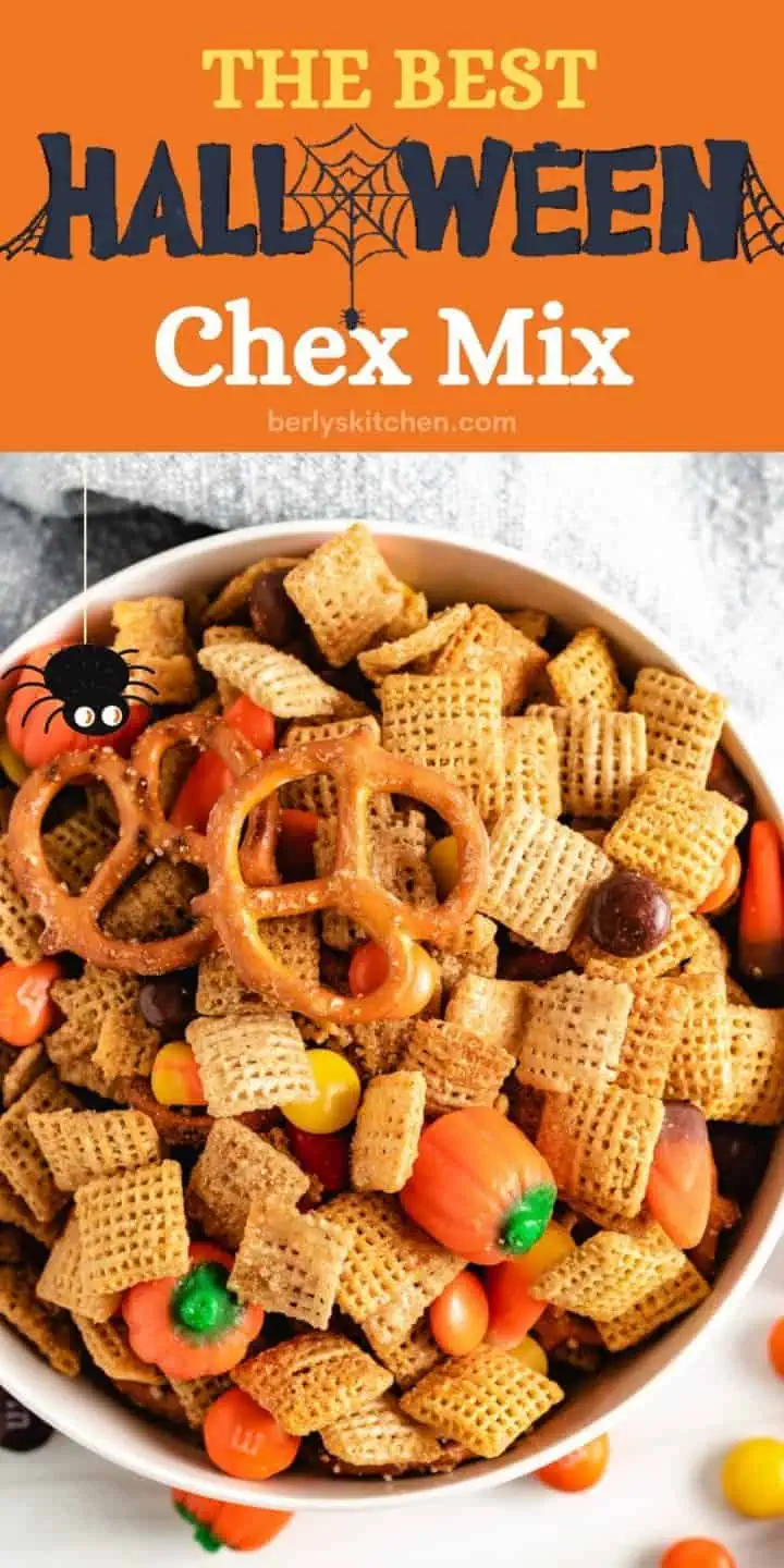 Top down view of halloween chex mix in a white bowl.