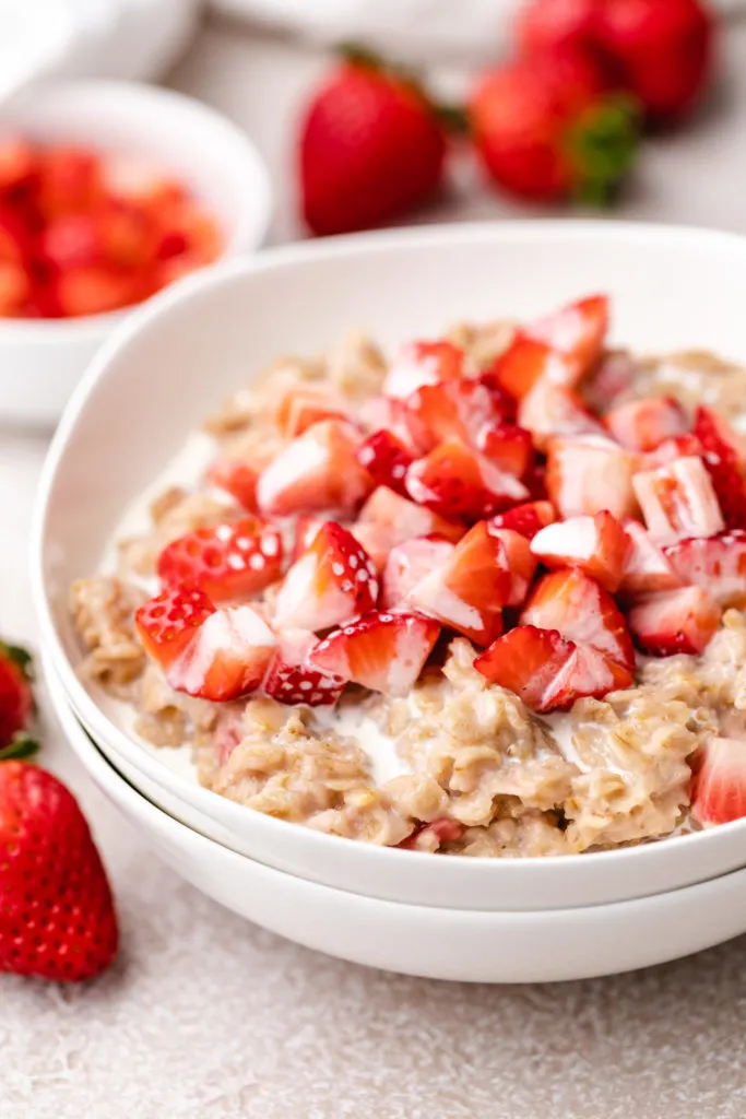 Strawberries and cream on top of old fashioned oats.