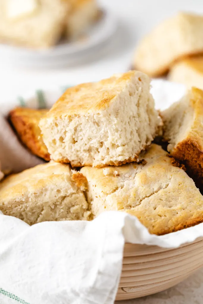 Close up view of a pile of biscuits in a bowl.