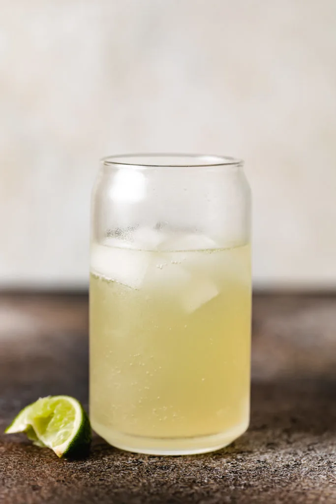 Ginger beer poured over ice.