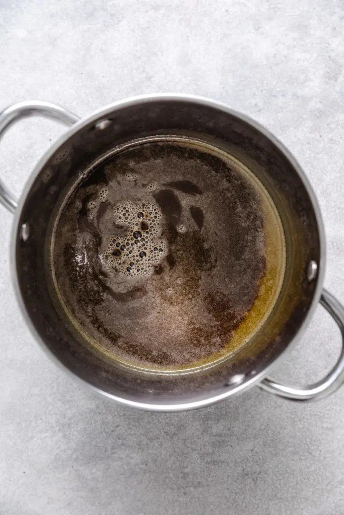 Irish stout poured over eggs and sugar mixture.