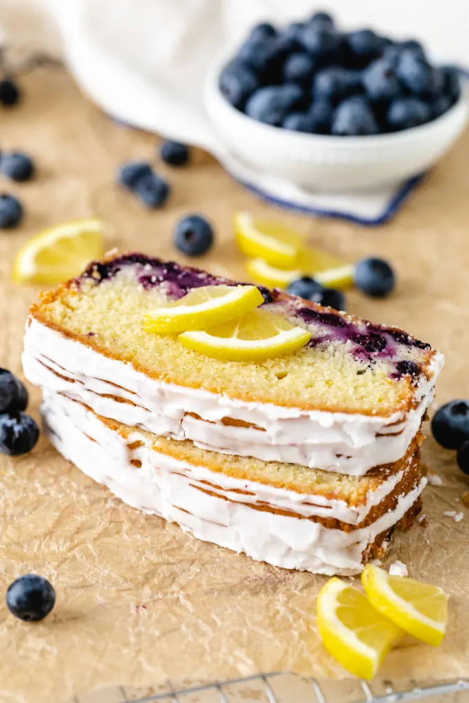 Stack of blueberry lemon bread slices.