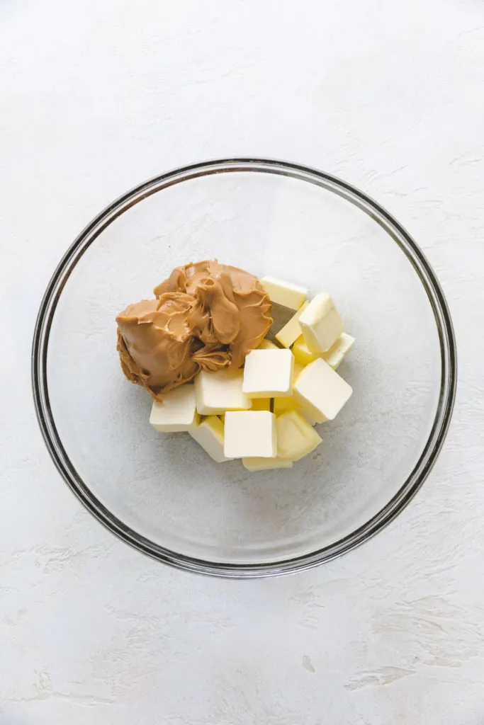 Butter and peanut butter in a bowl.