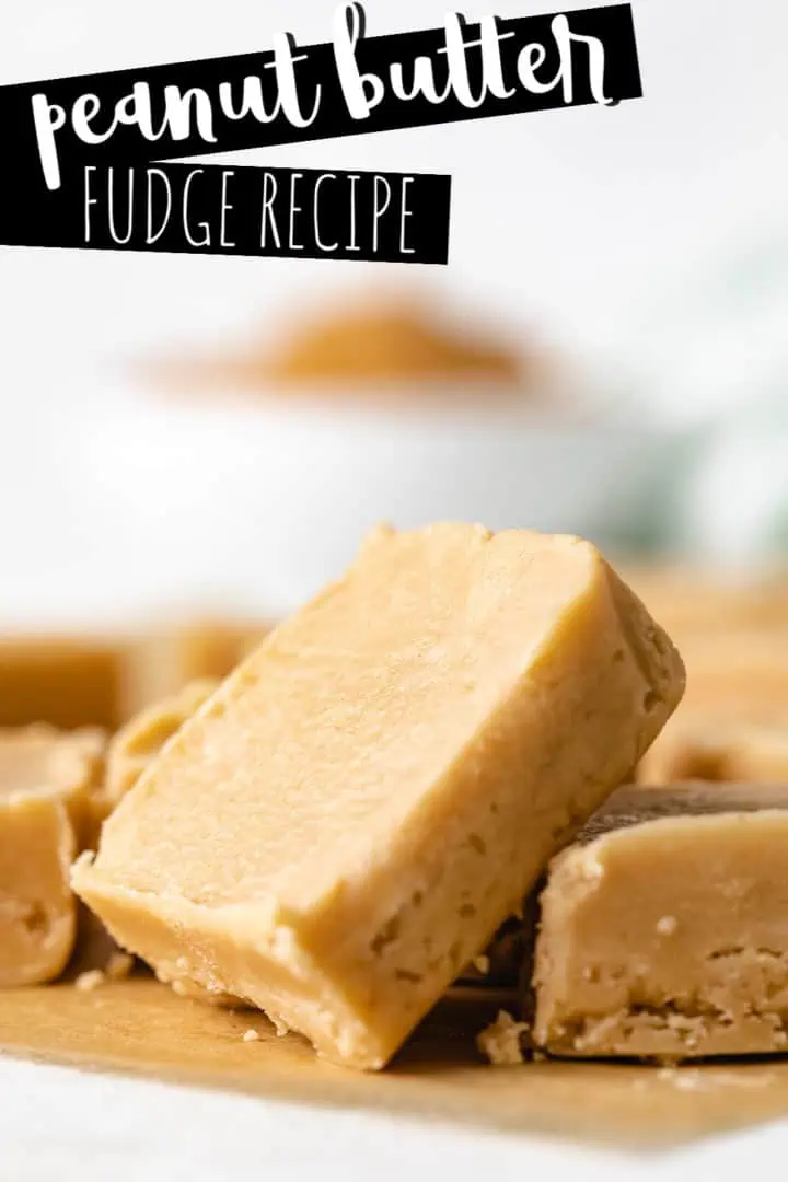 Close up view of pieces of fudge on parchment paper.