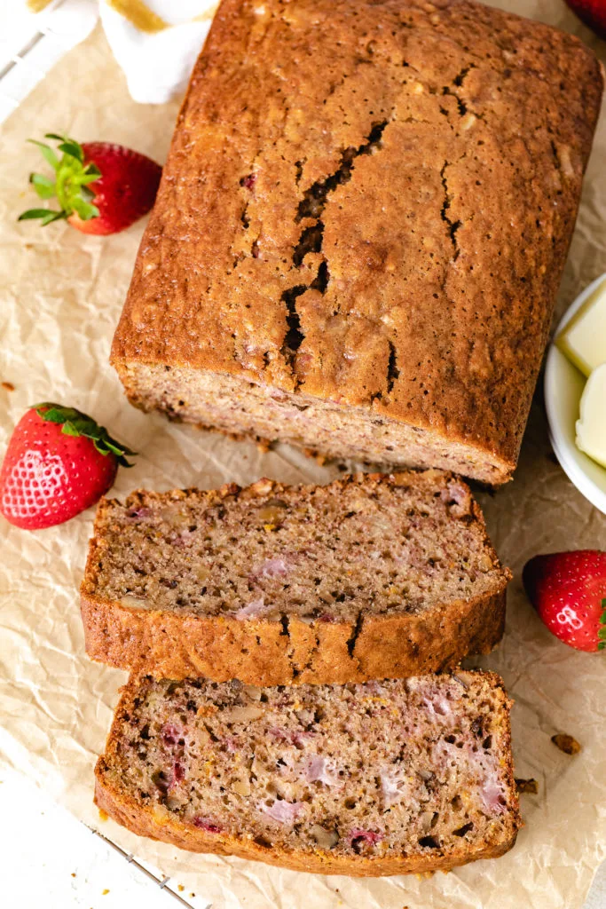 Top down view of sliced strawberry nut bread.