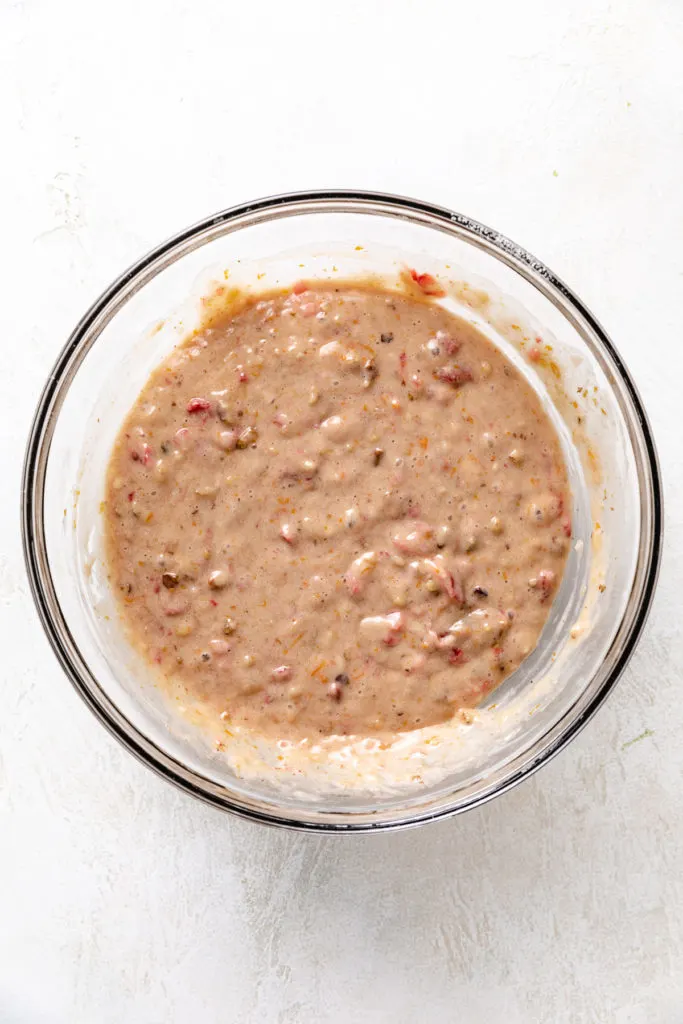 Bowl of bread batter in a glass bowl.