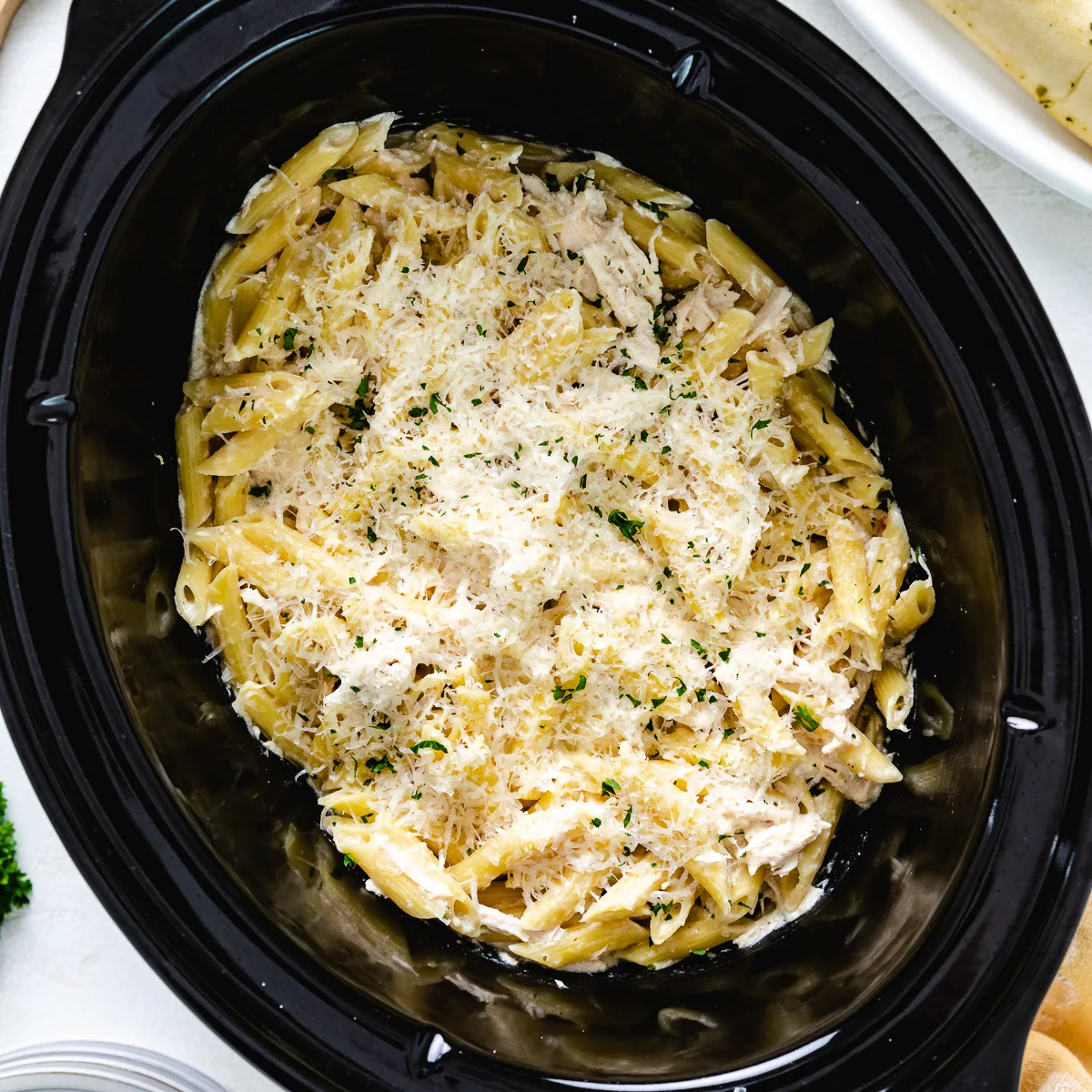 Close up view of cheesy olive garden chicken pasta.