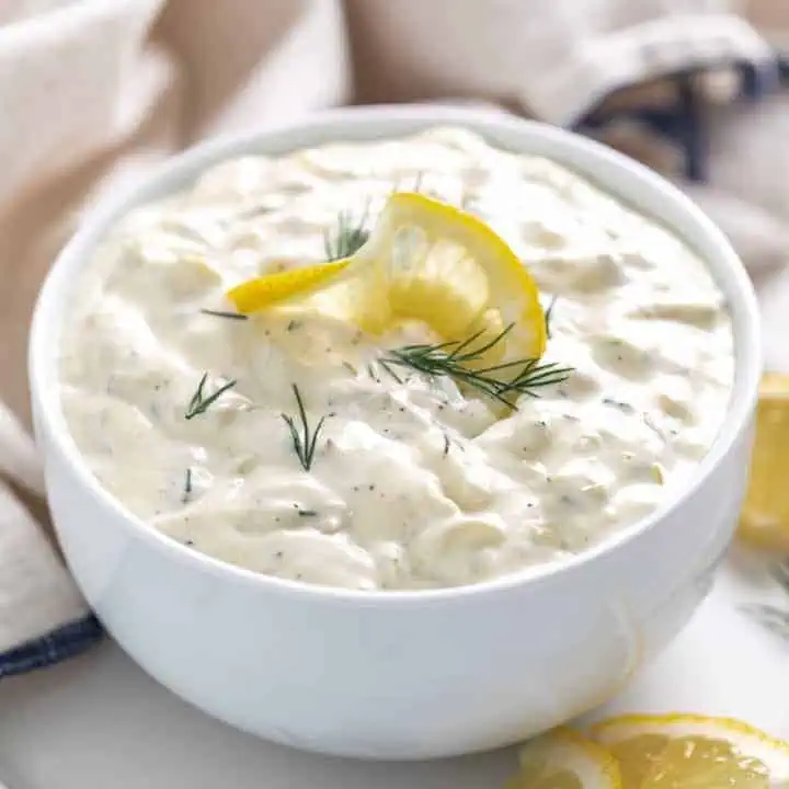 Serving bowl filled with a seafood condiment.