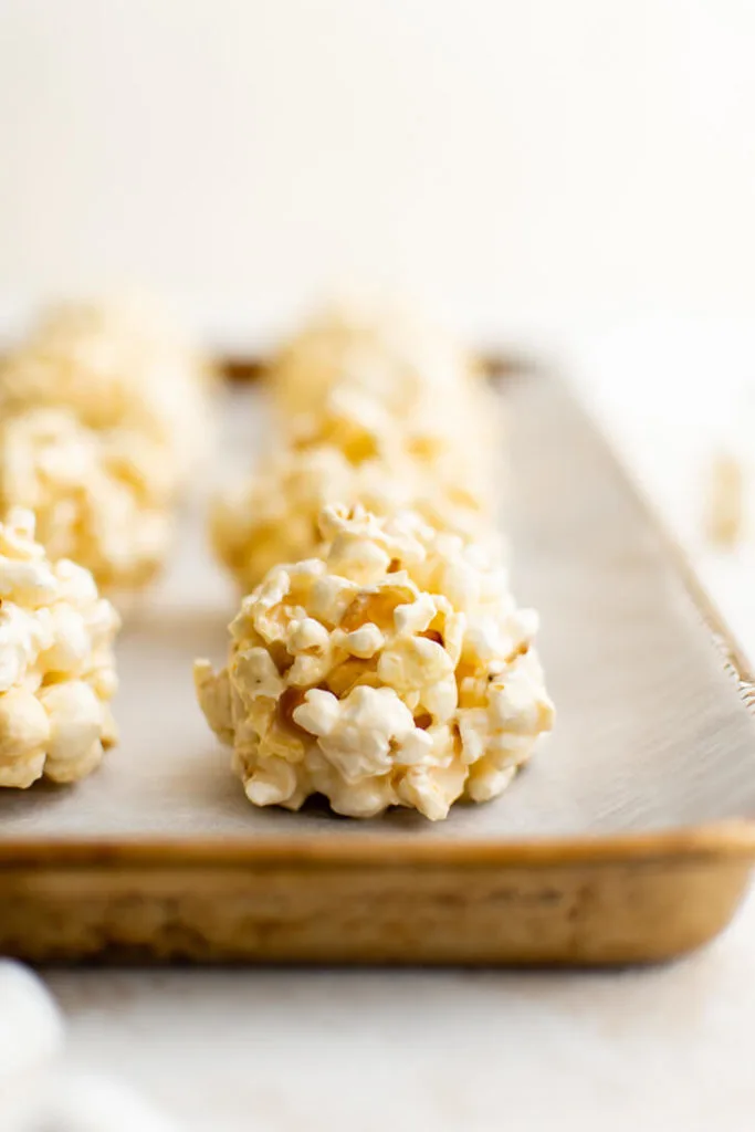 Tray filled with popcorn marshmallow balls.