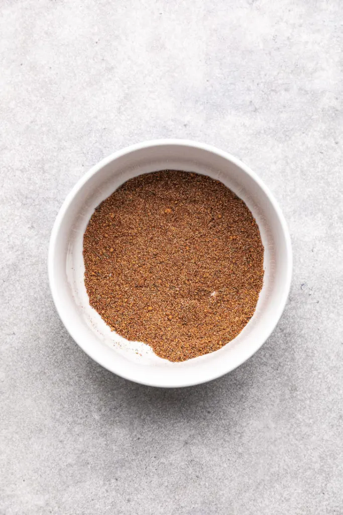 Spice blend in a white bowl.