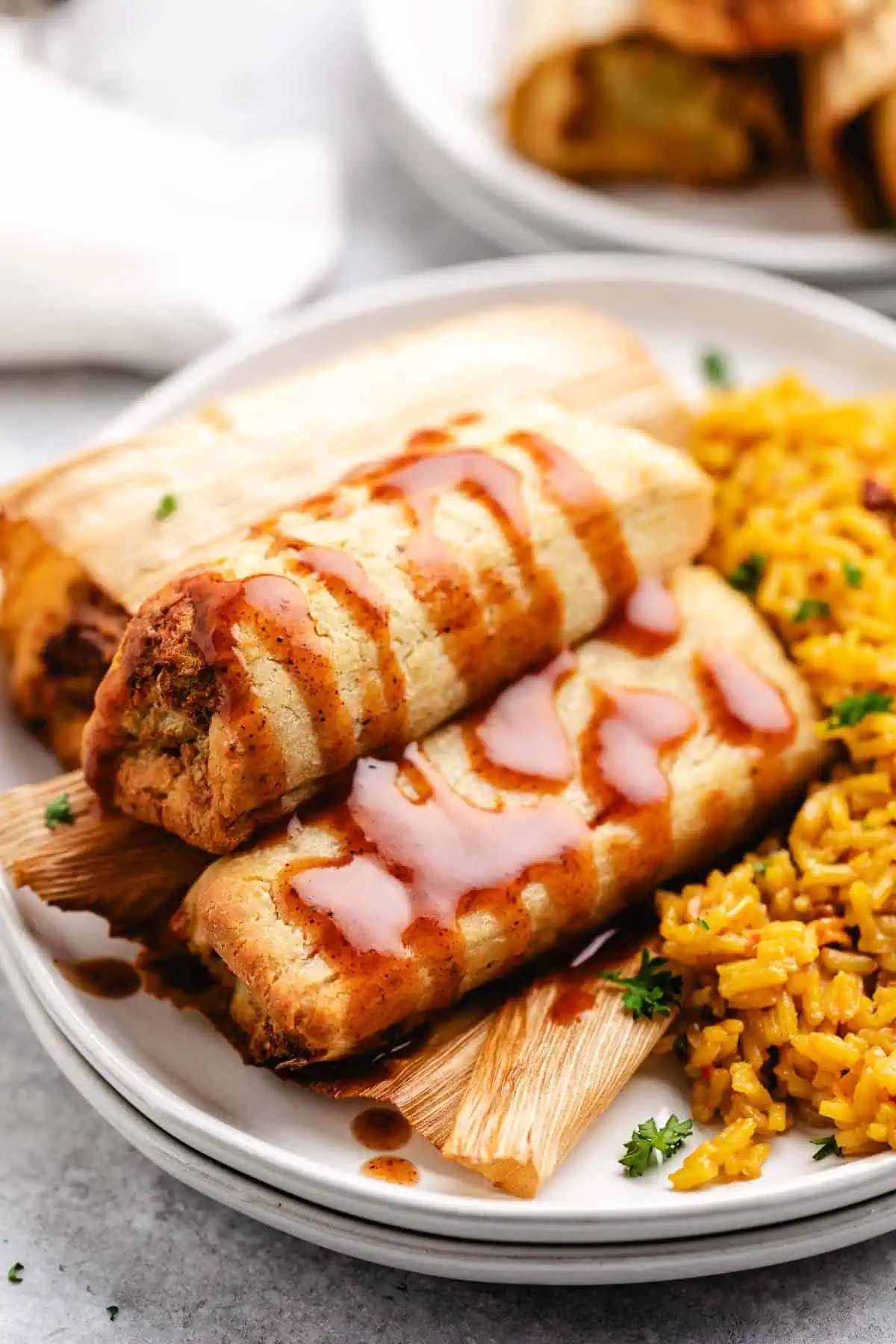 Plate of tamales heated in the air fryer.