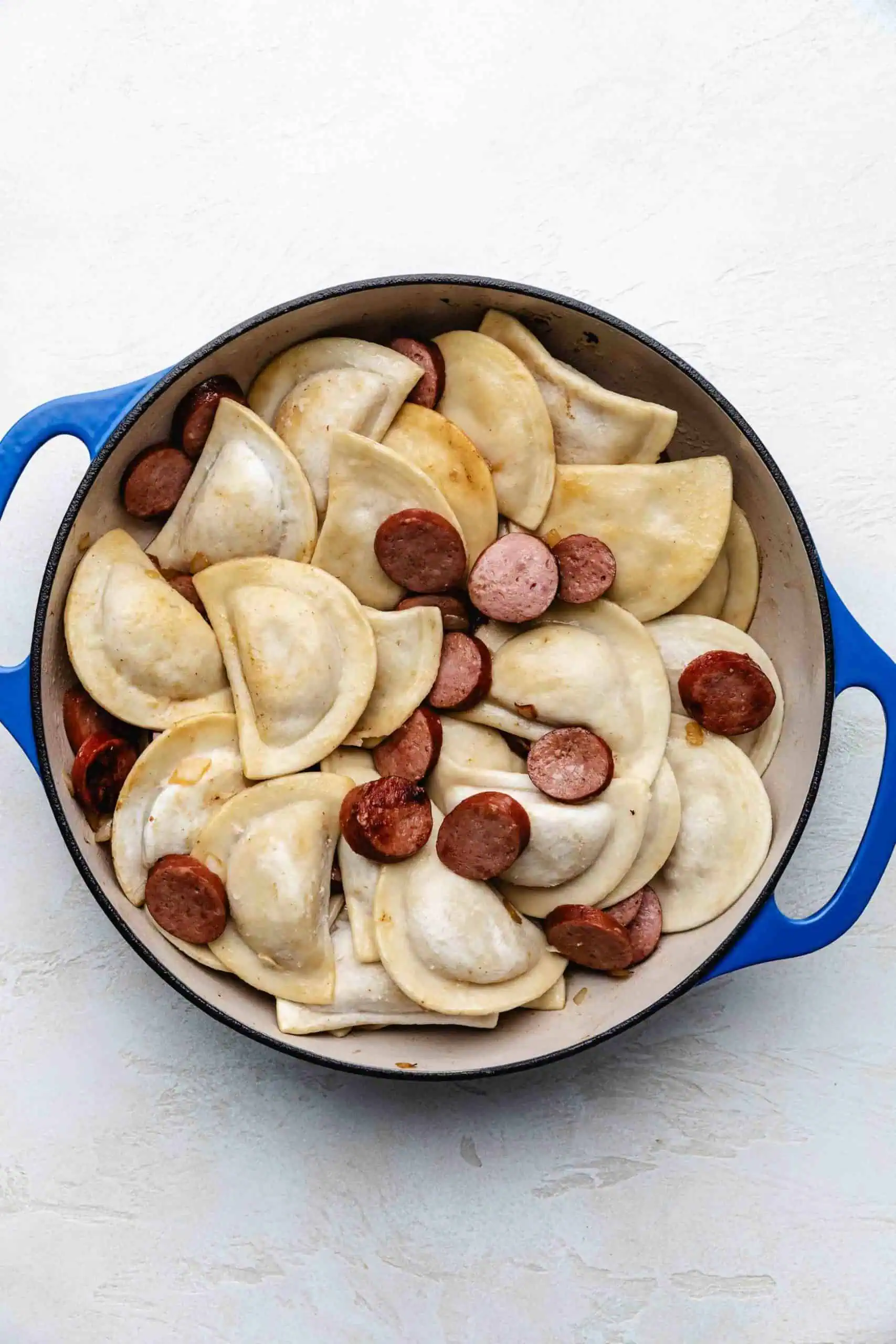 Pierogi tossed with sausage.