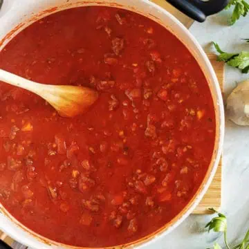 Top down view of a pan of beef bolognese.