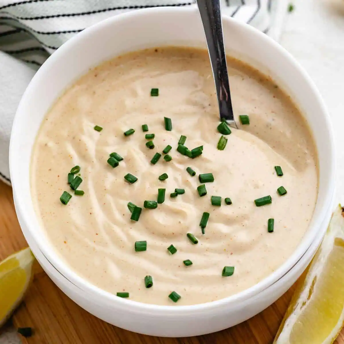 Top down view into a bowl of crab cake sauce.