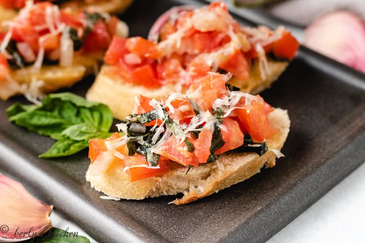 Classic bruschetta on toasted baguette.