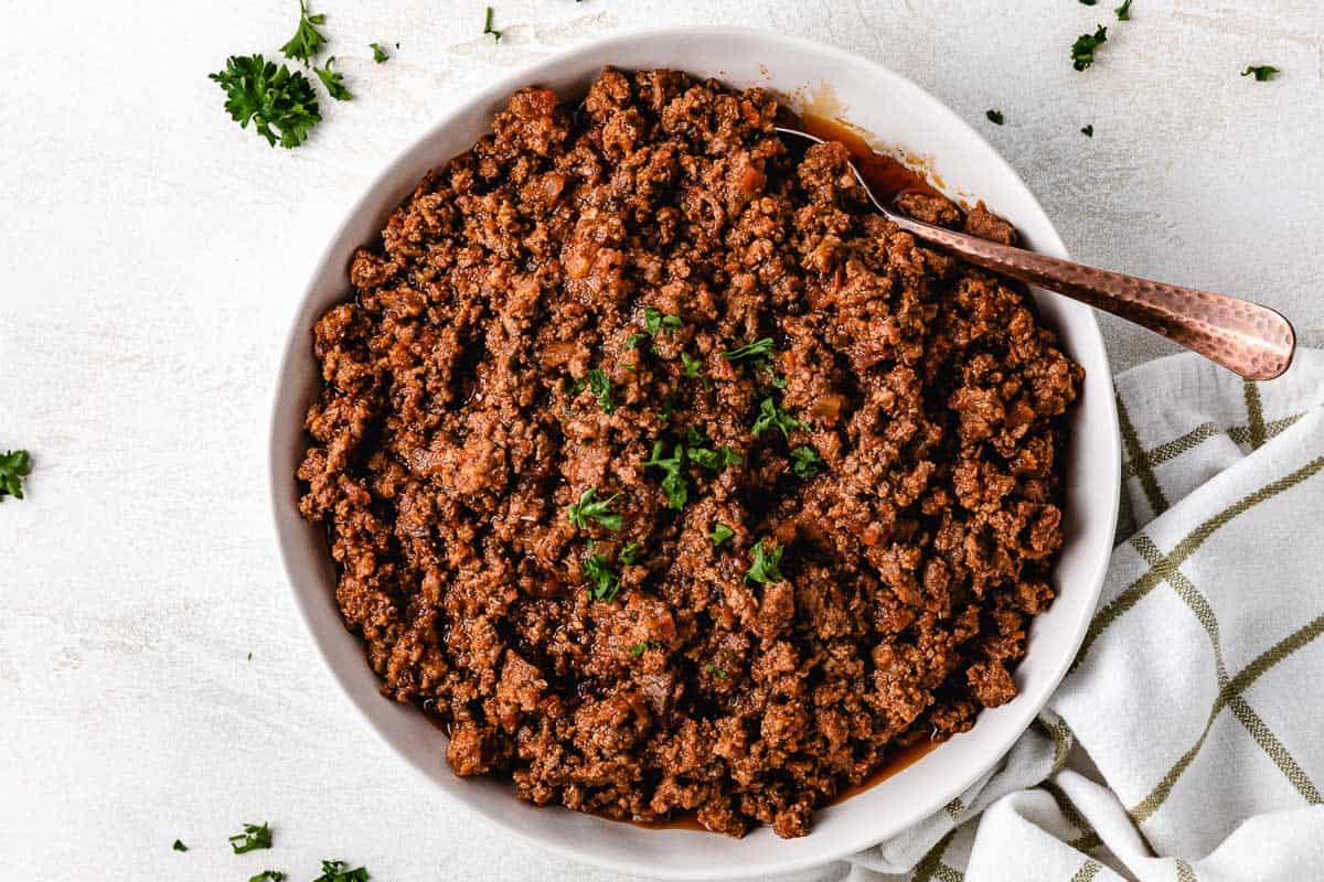 Taco meat in a large serving bowl.