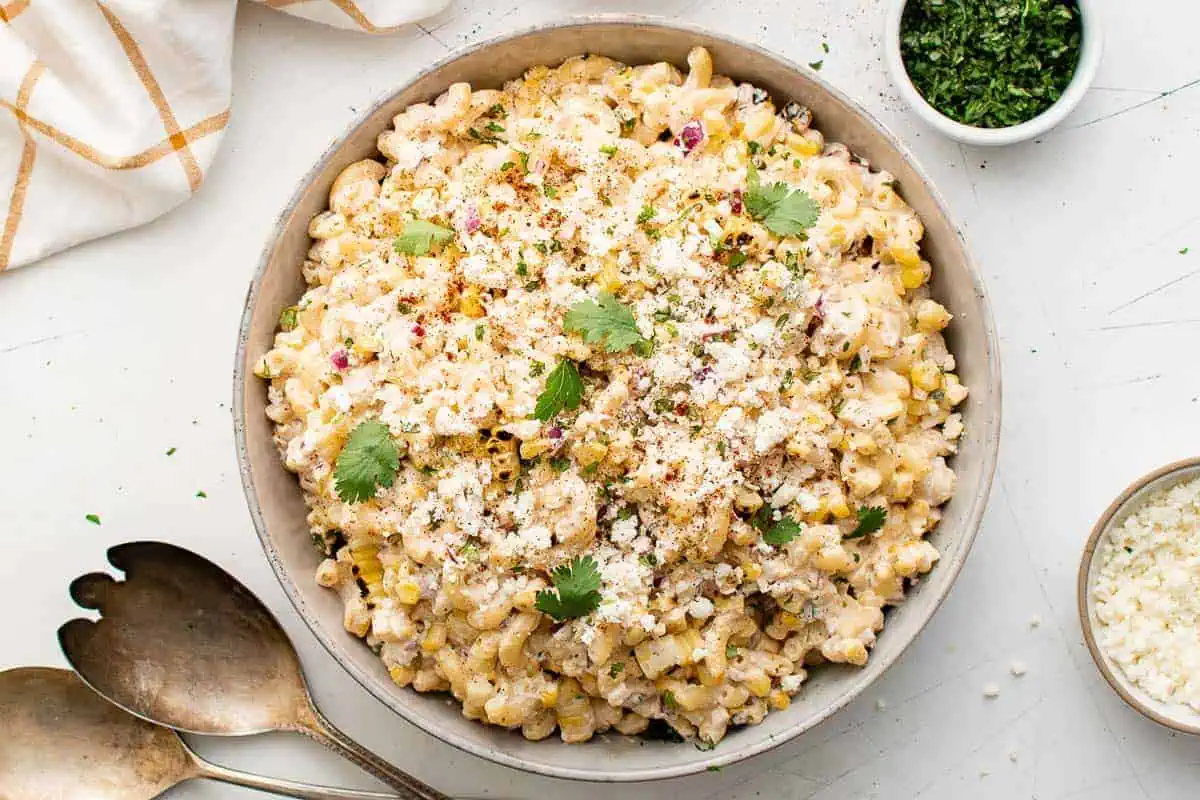 Top down view mexican street corn pasta salad in a serving bowl.