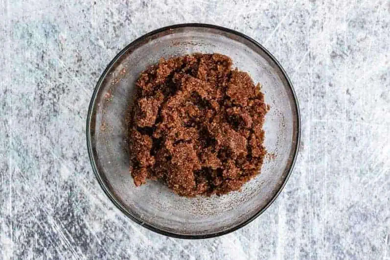 Ground cinnamon, butter, and sugar in a small bowl.