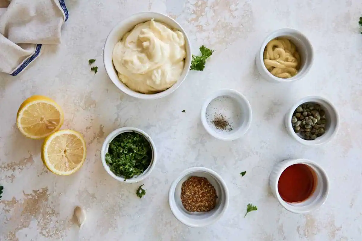 Top down view of ingredients for remoulade sauce.