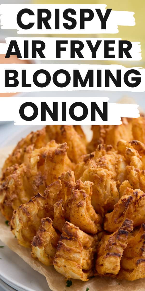 Crispy air fryer blooming onion displayed on a plate with text overlay reading 'crispy air fryer blooming onion'