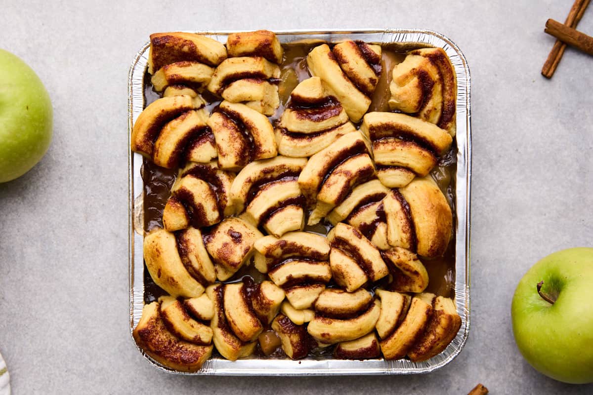 Baked cinnamon rolls over apple pie filling.