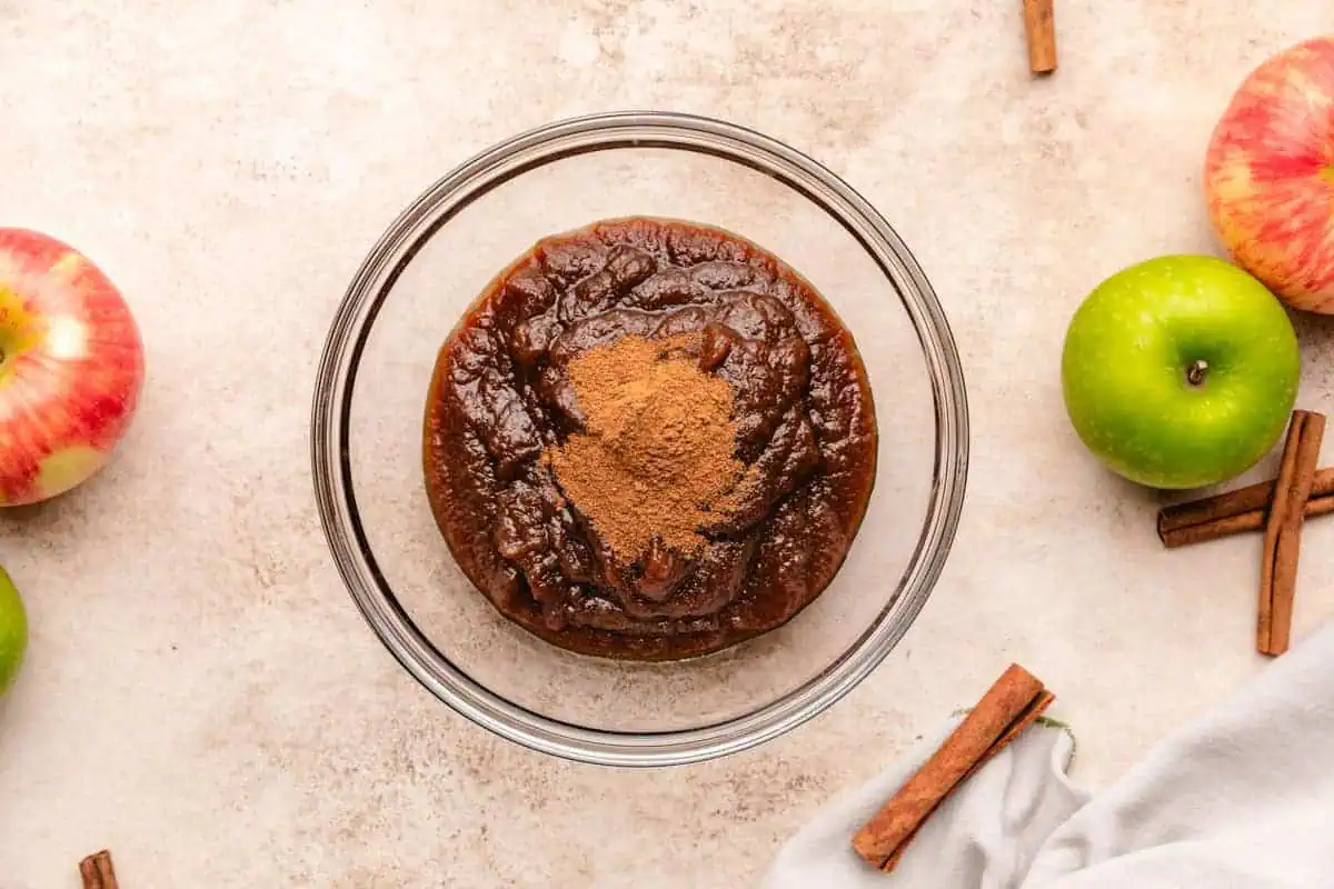 Apple pie spice and apple butter in a bowl.