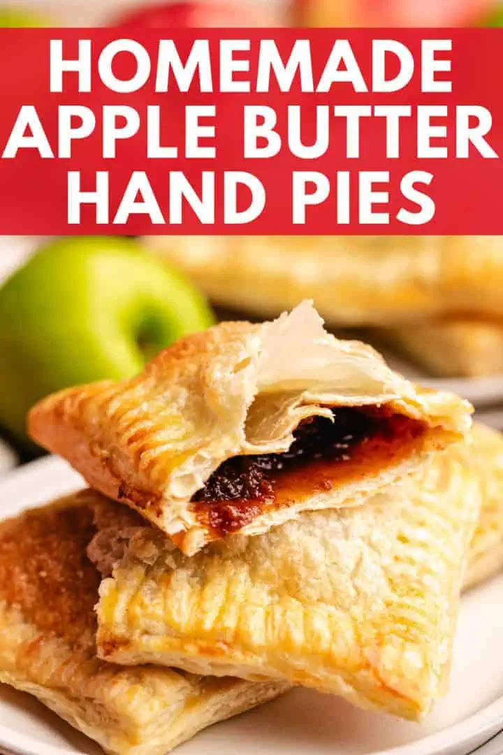 A close-up of homemade apple hand pies with puff pastry and apple butter filling.