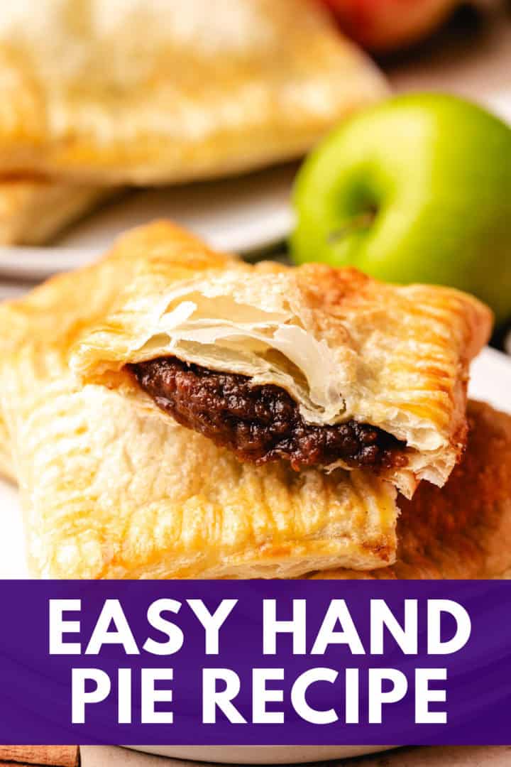 Freshly baked handheld apple pie showcasing flaky pastry and spiced apple butter.