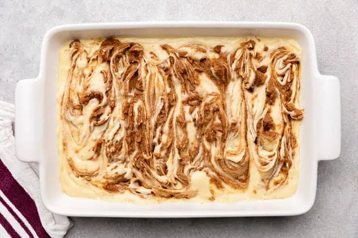 Cinnamon filling swirled into cake batter.