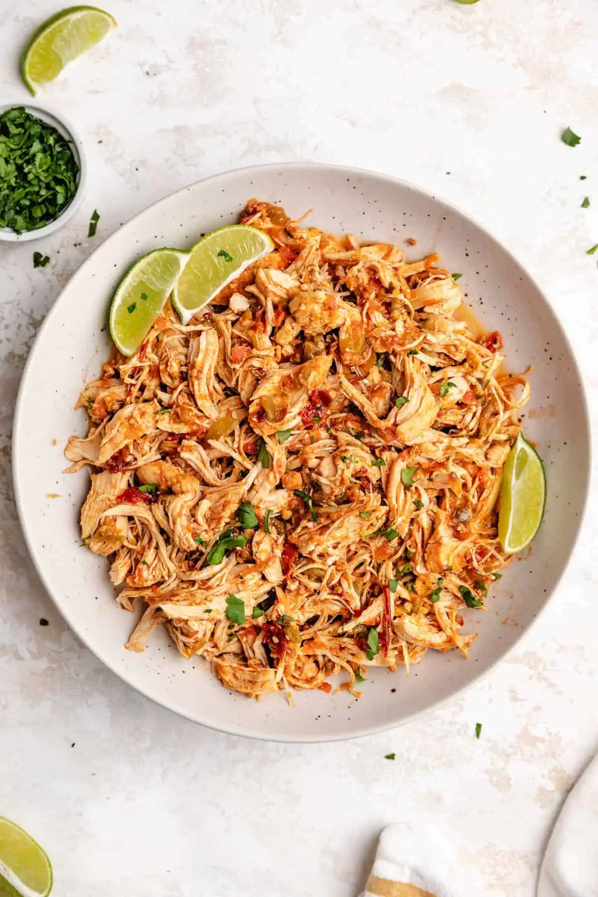 Instant pot salsa chicken in a large bowl.