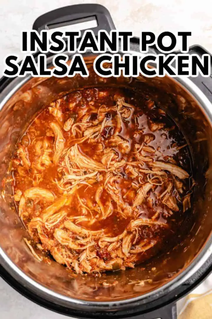 Top down view of salsa chicken in a pressure cooker.