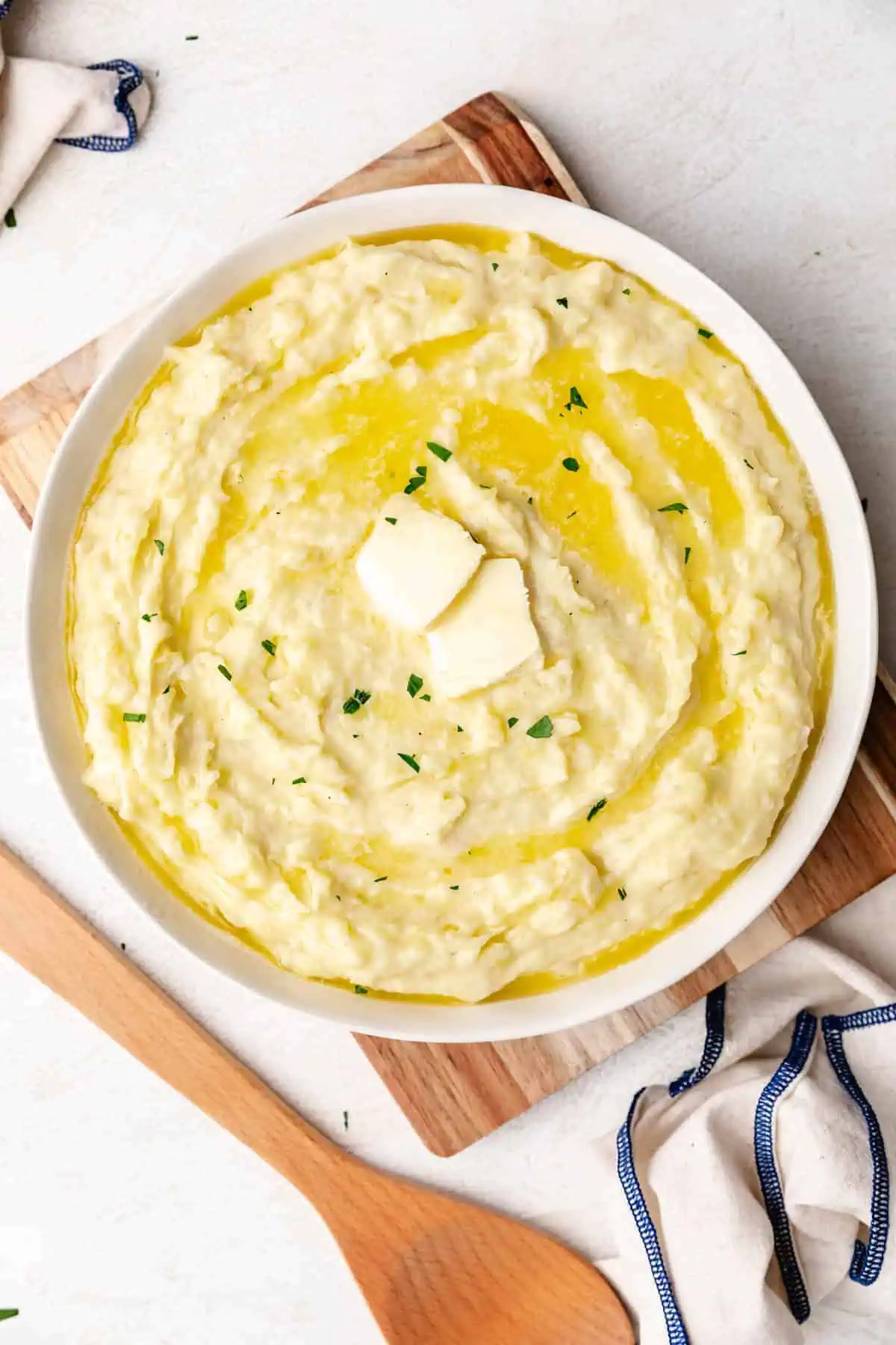 Top down view of parmesan mashed potatoes in a large dish.