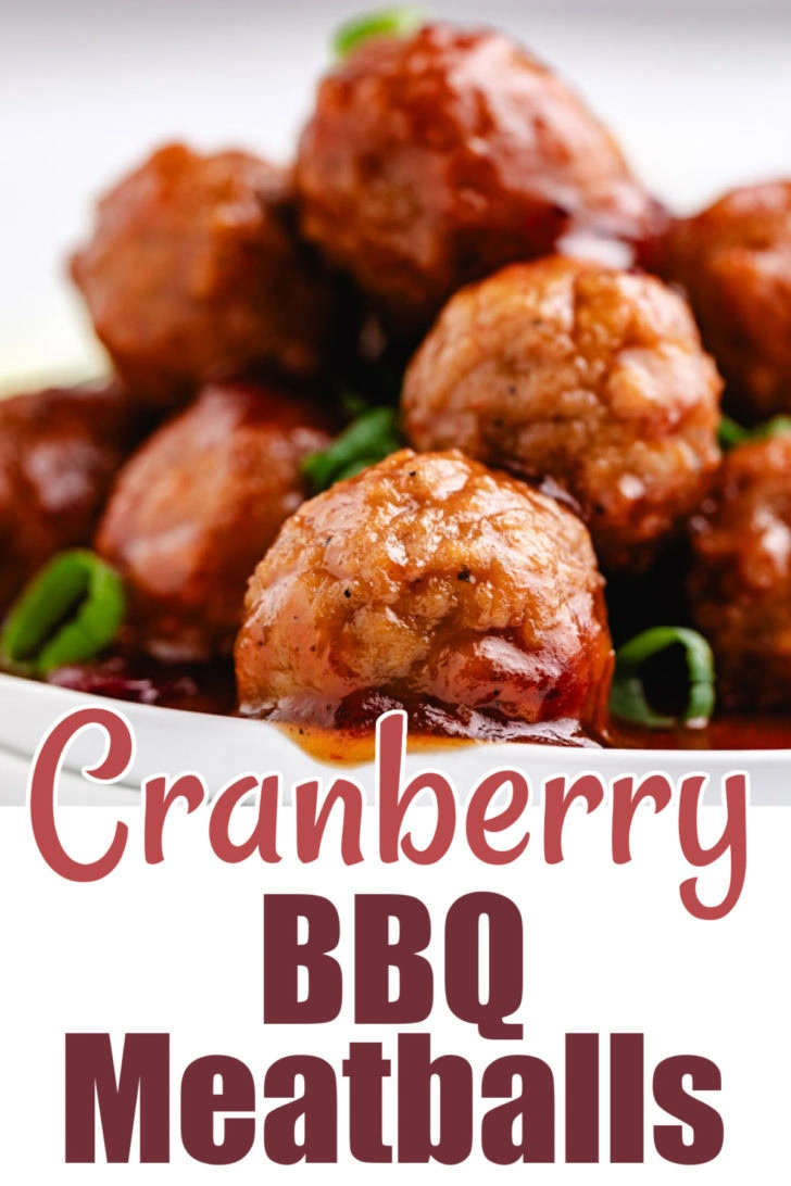 Close up view of cranberry bbq meatballs on a plate.