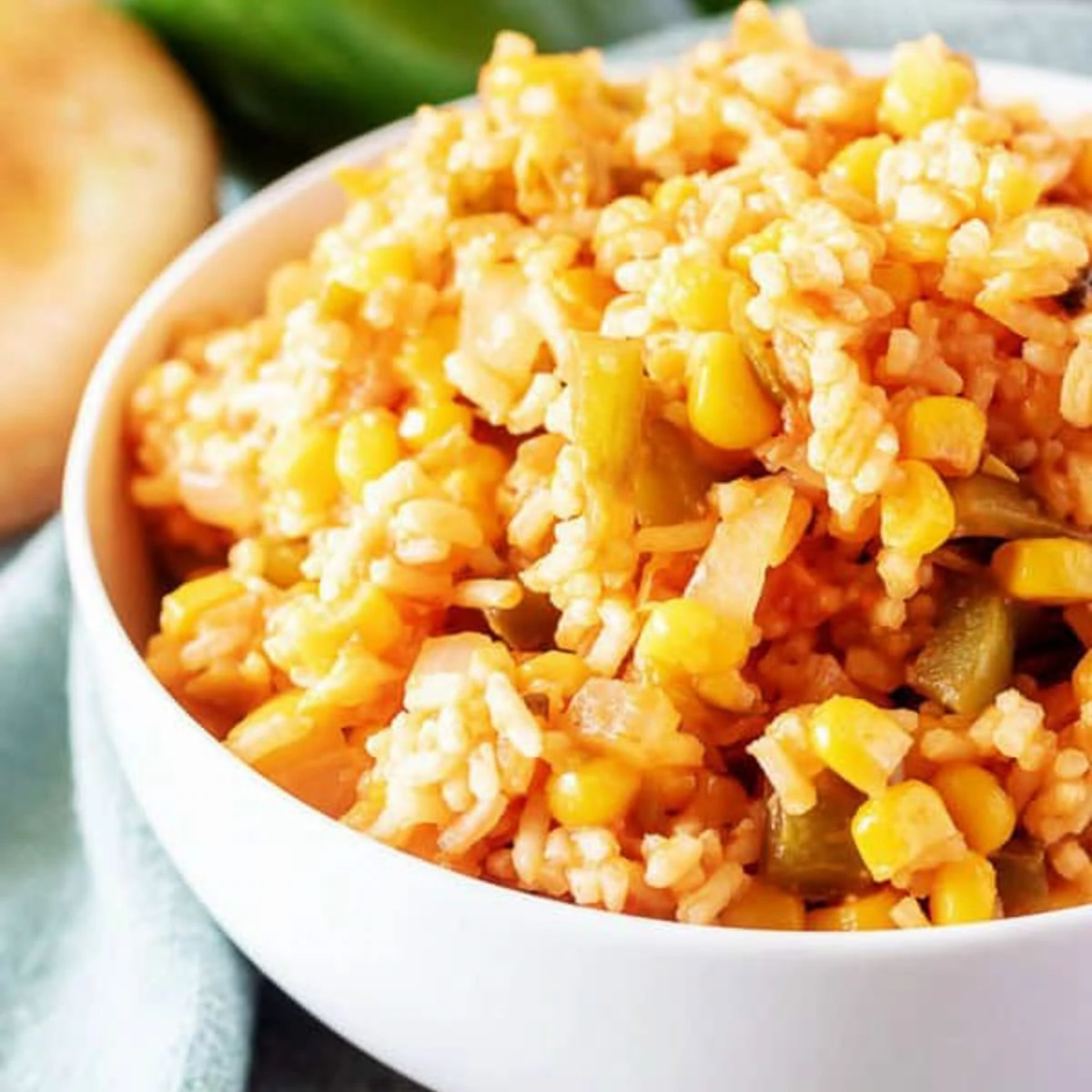 Close up view of a bowl of mexican rice.