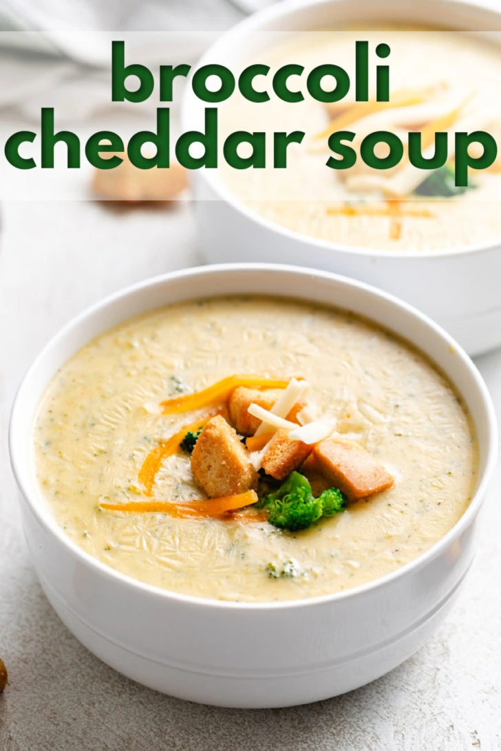 Close up view of cheddar broccoli soup in a bowl.