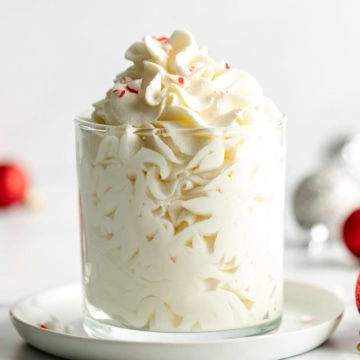 Close up view of whipped cream in a container.