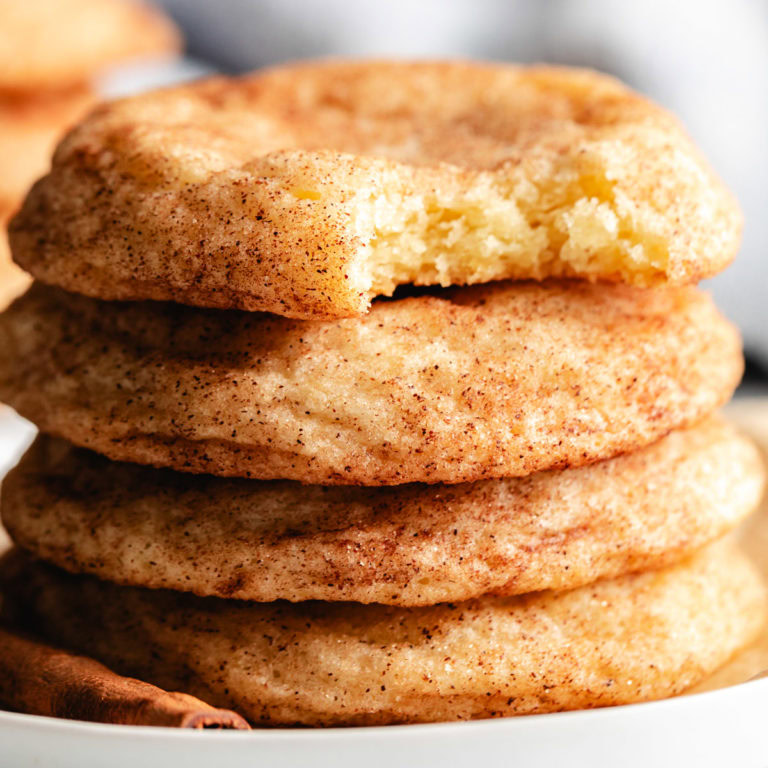 Close up view of a stack of snickerdoodle cookies.