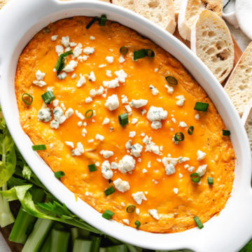 Close up view of cheesy buffalo chicken dip.