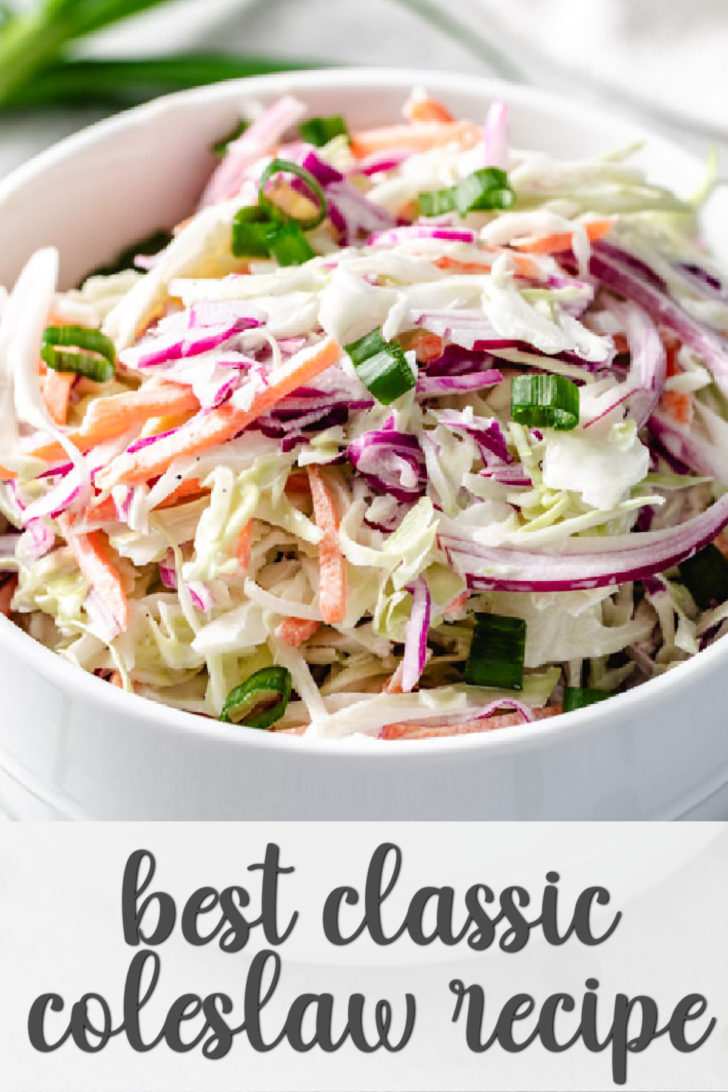 A bowl of coleslaw with a linen napkin in the background.