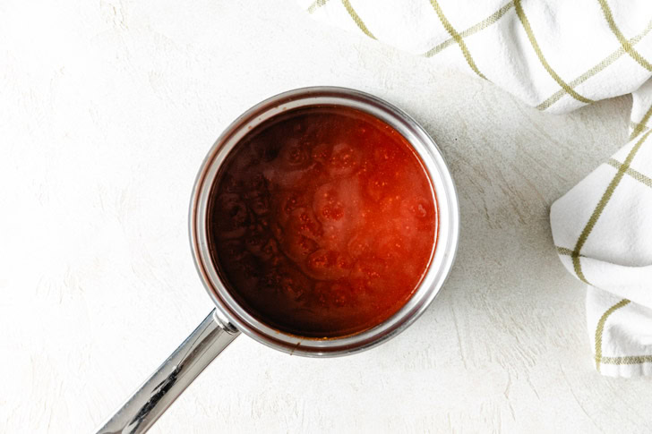 A saucepan with homemade bbq sauce.