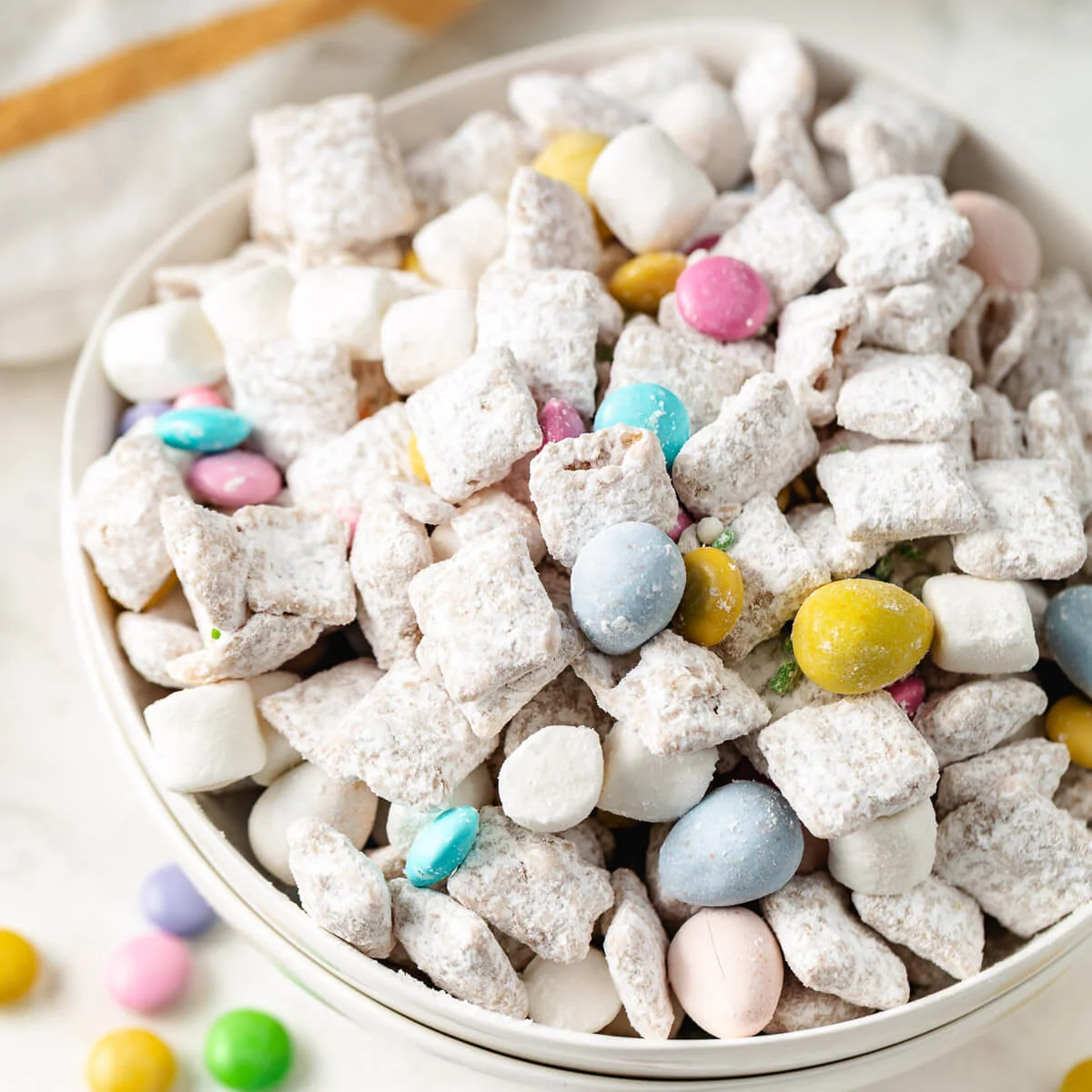 A bowl of cereal with candy.