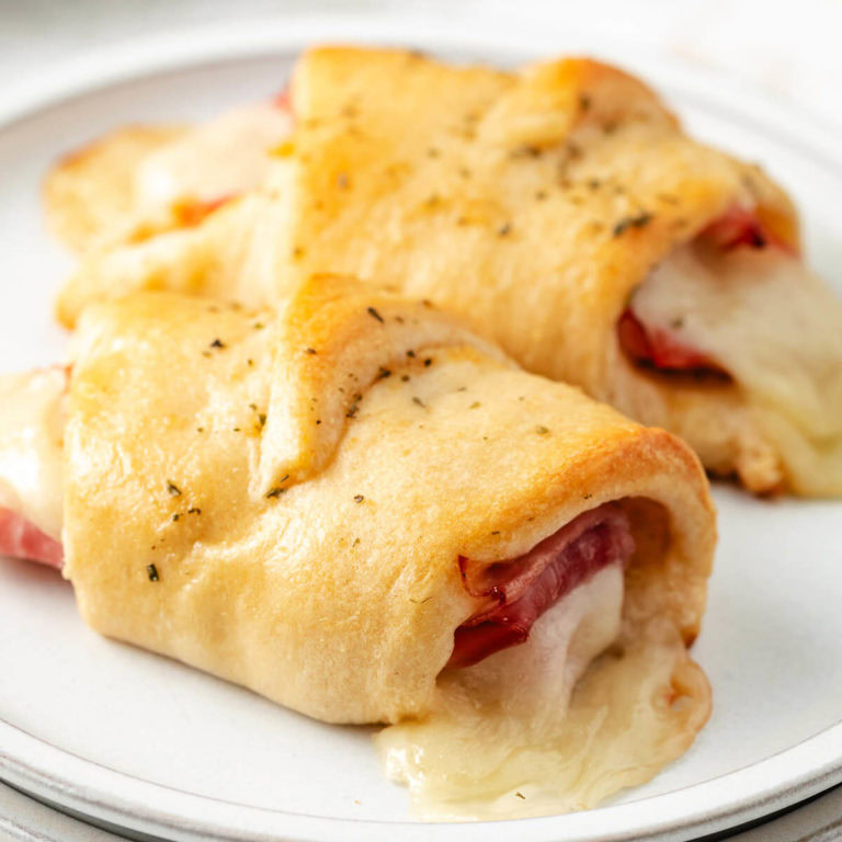 Close-up of ham and cheese crescent roll ups.