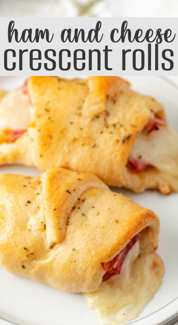 Golden-brown crescent rolls with ham and cheese.