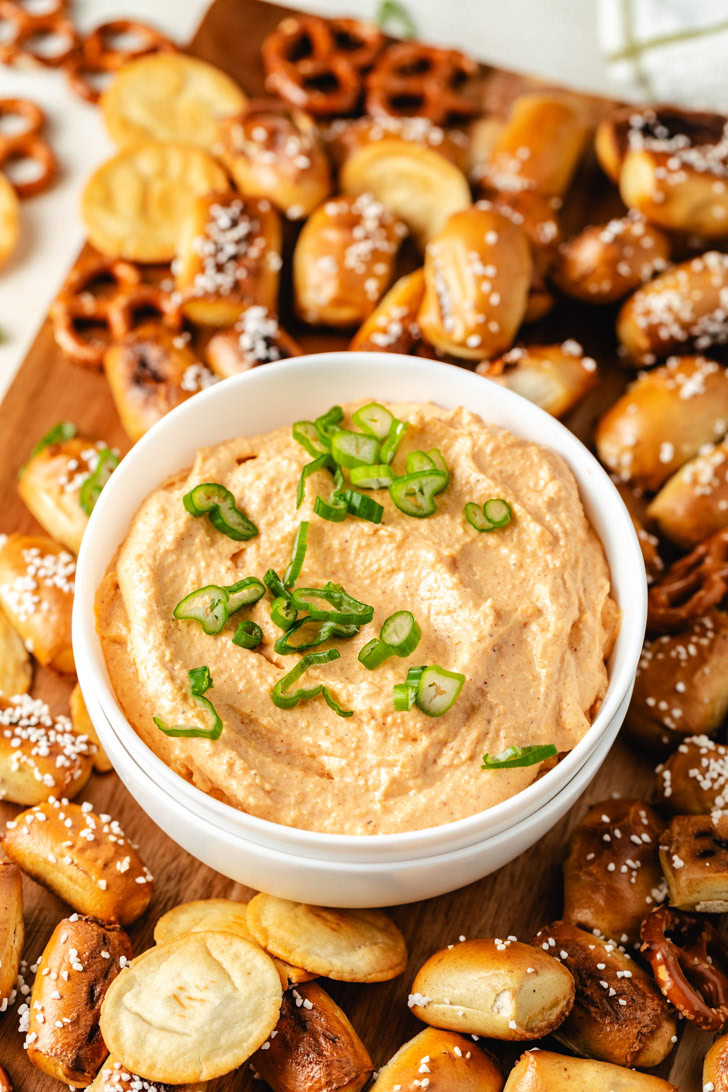 Homemade pub cheese dip served in a bowl.